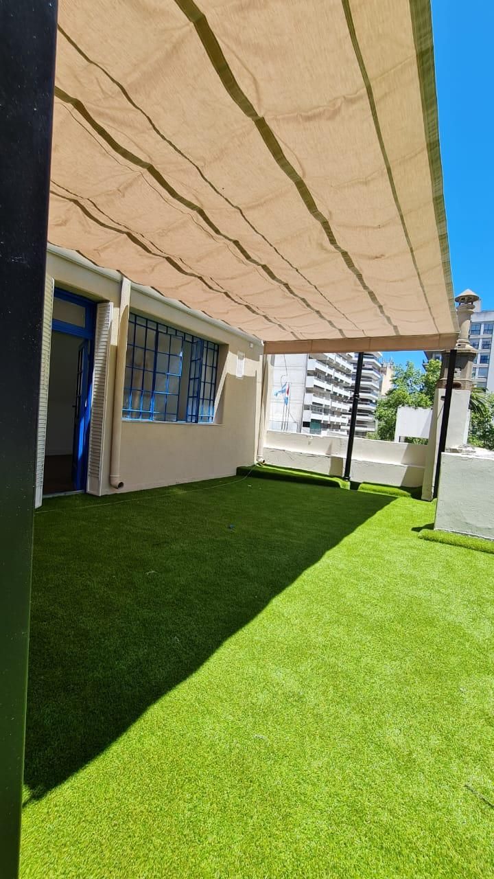 Pérgola corrediza sobre patio